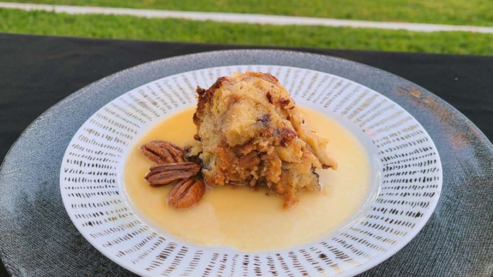 Bourbon pudding on a plate.