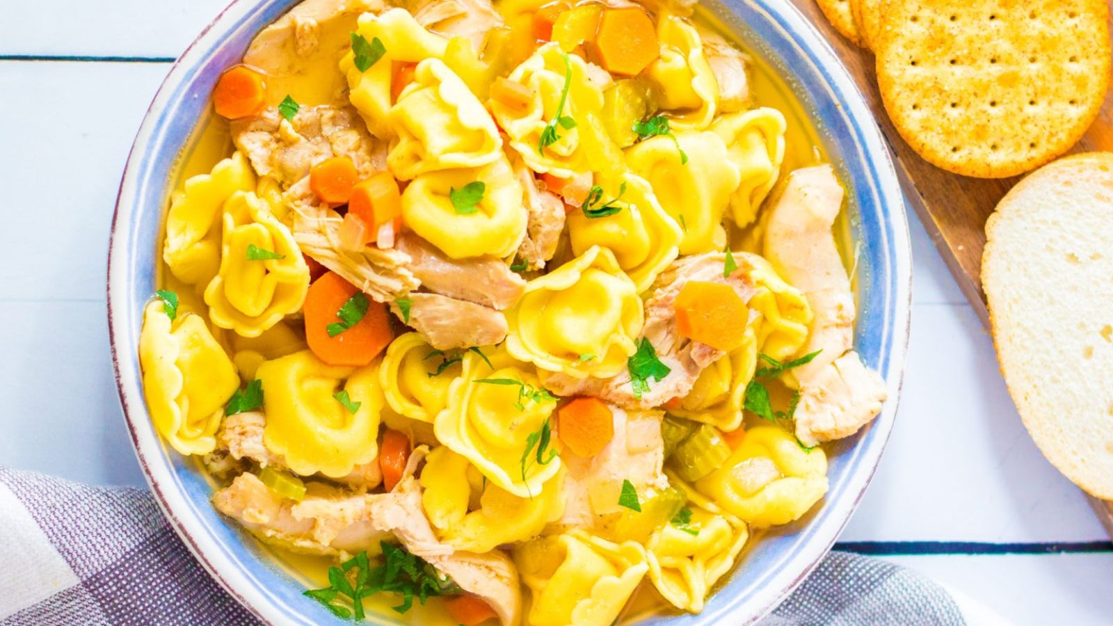 Chicken tortellini soup in a bowl.