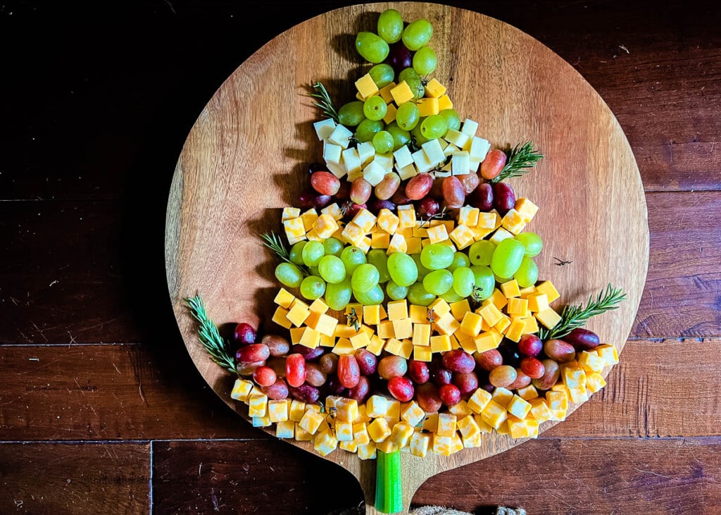 Christmas tree shaped fruit and cheese board.