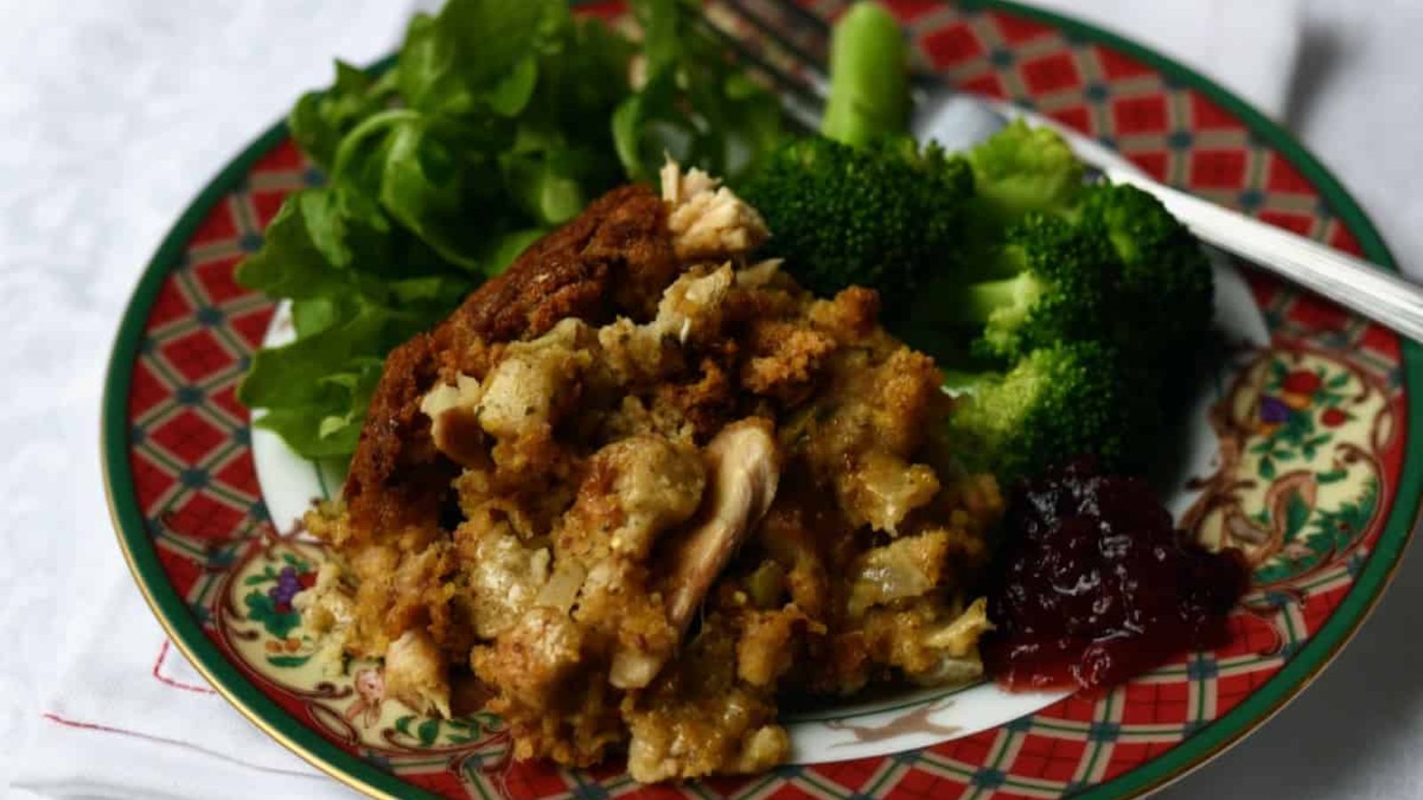 Crockpot chicken and dressing on a plate.