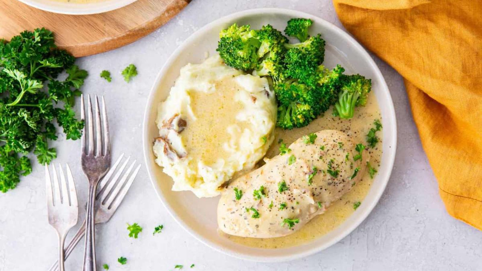 Crockpot ranch chicken on a plate.