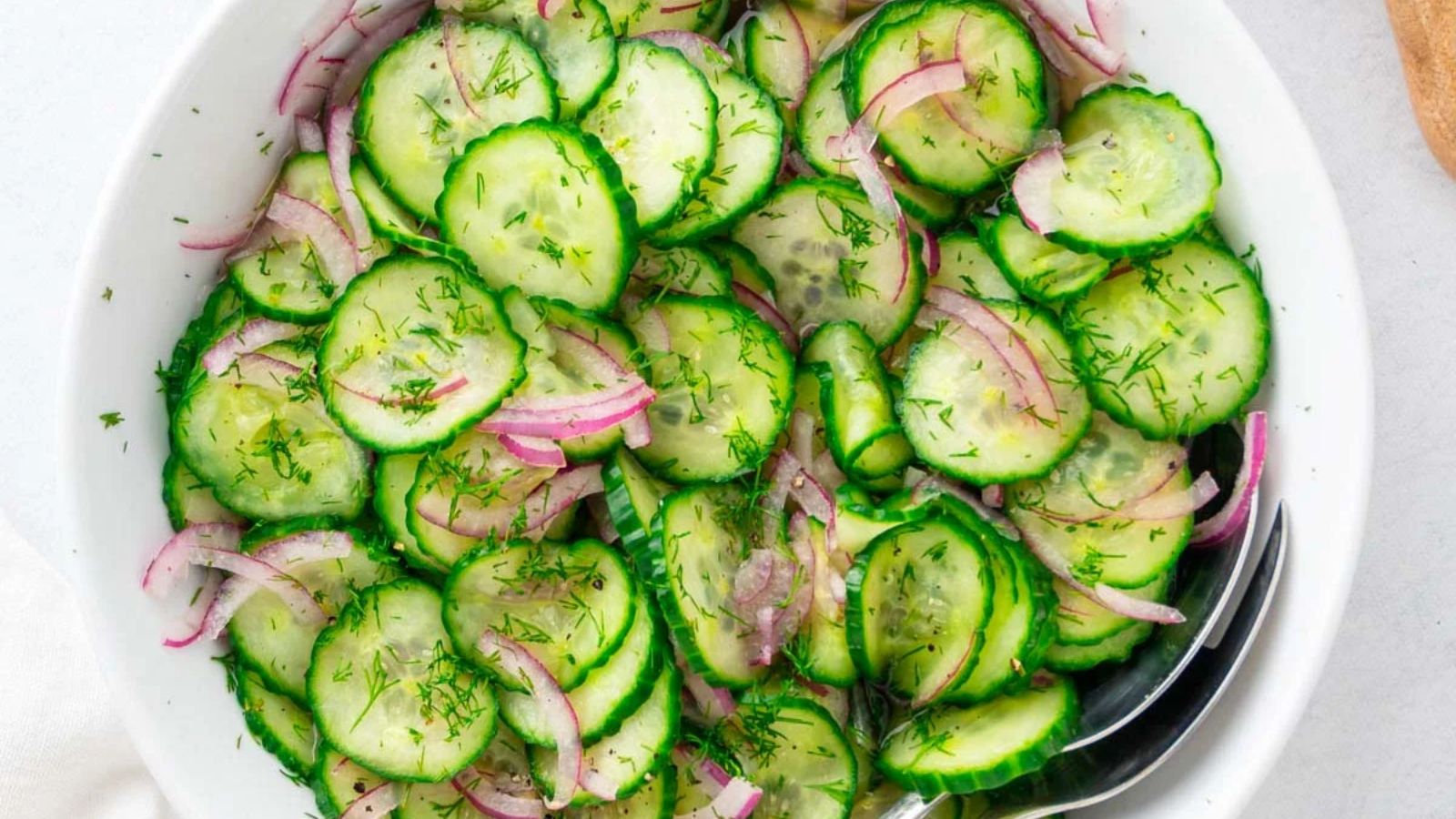 Cucumber salad in a bowl.