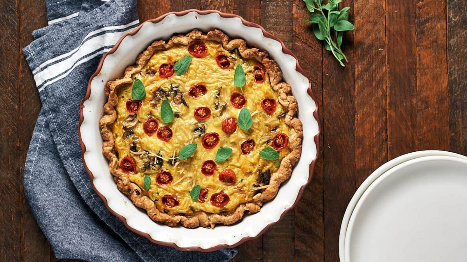 Whole egg quiche on a plate.