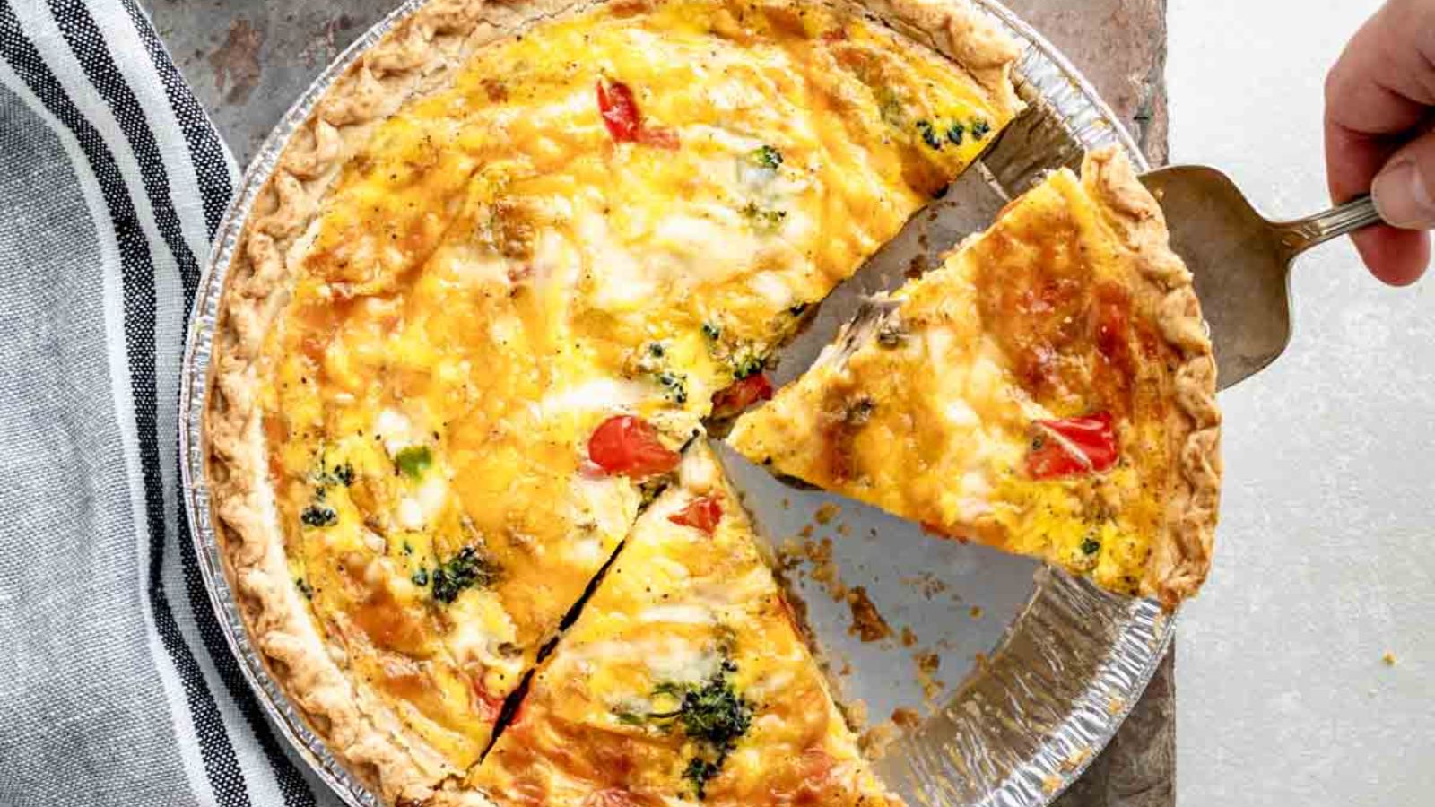 Veggie quiche with slices.