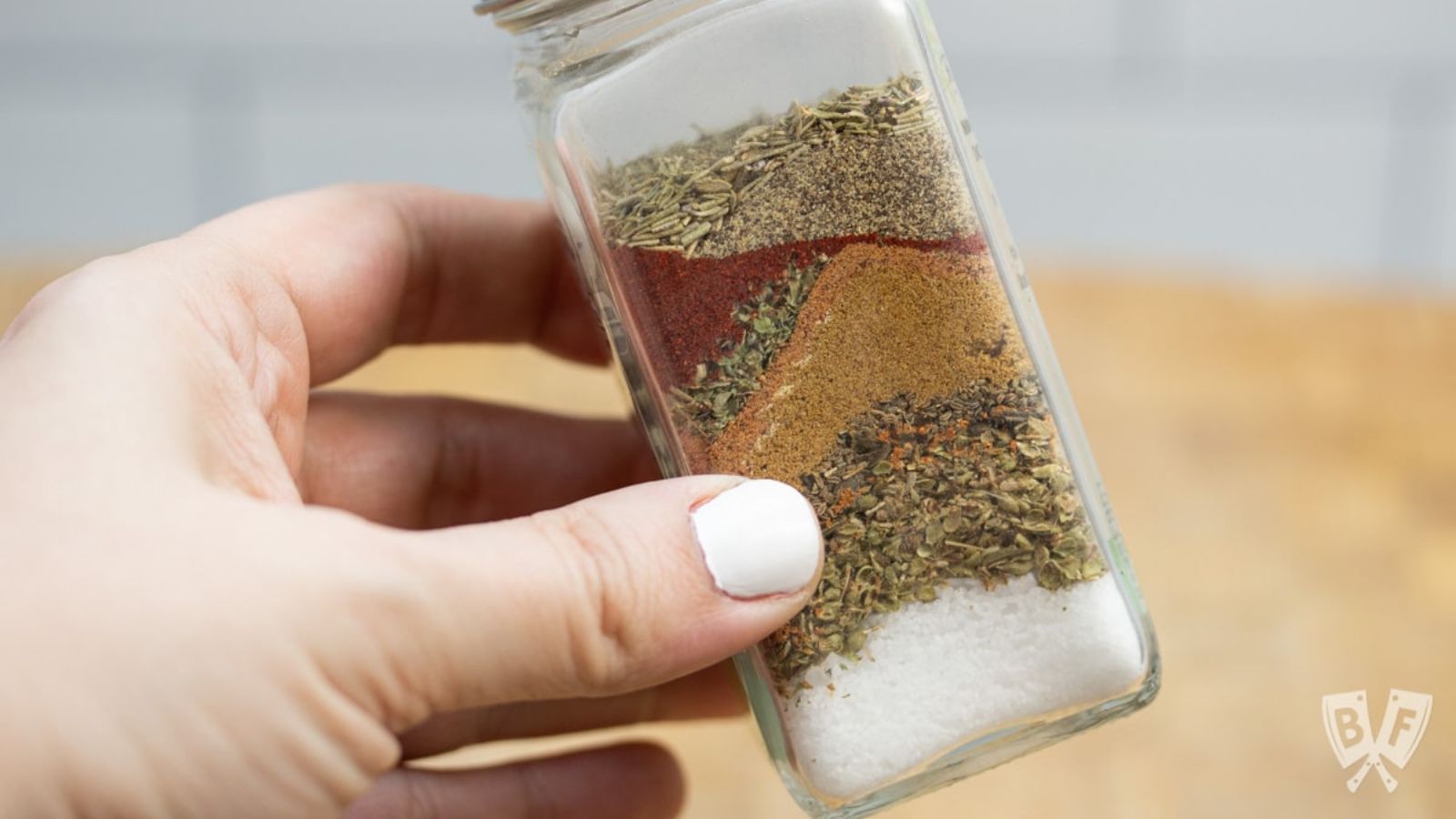 Fajita seasoning in a condiments bottle.
