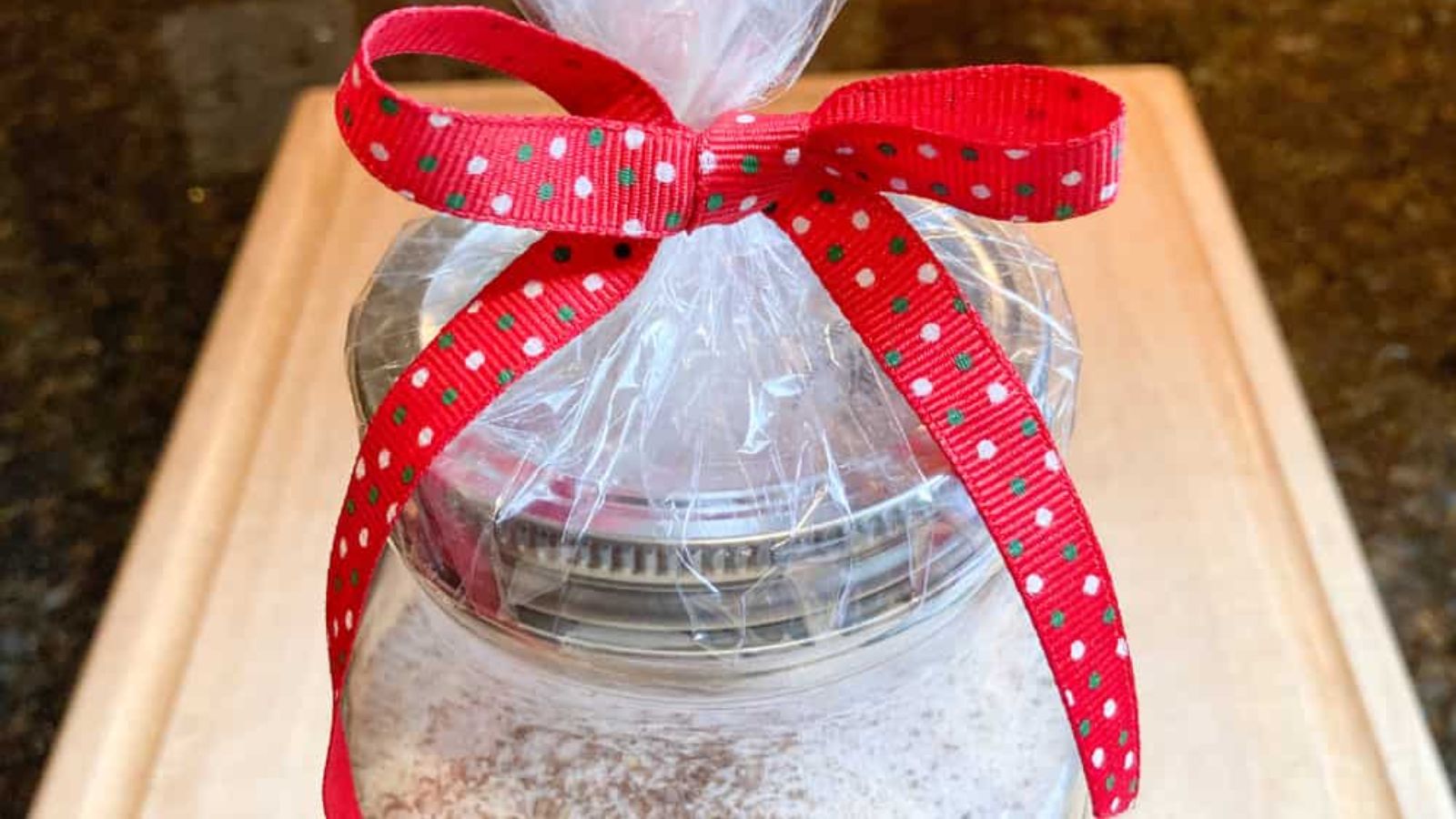 Wrapped jar with ribbon.