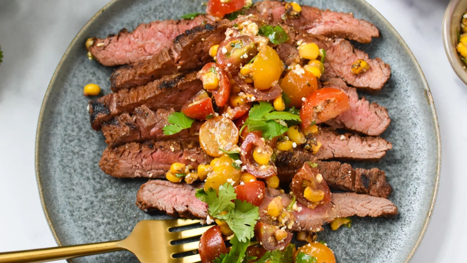 Flank steak on a plate.