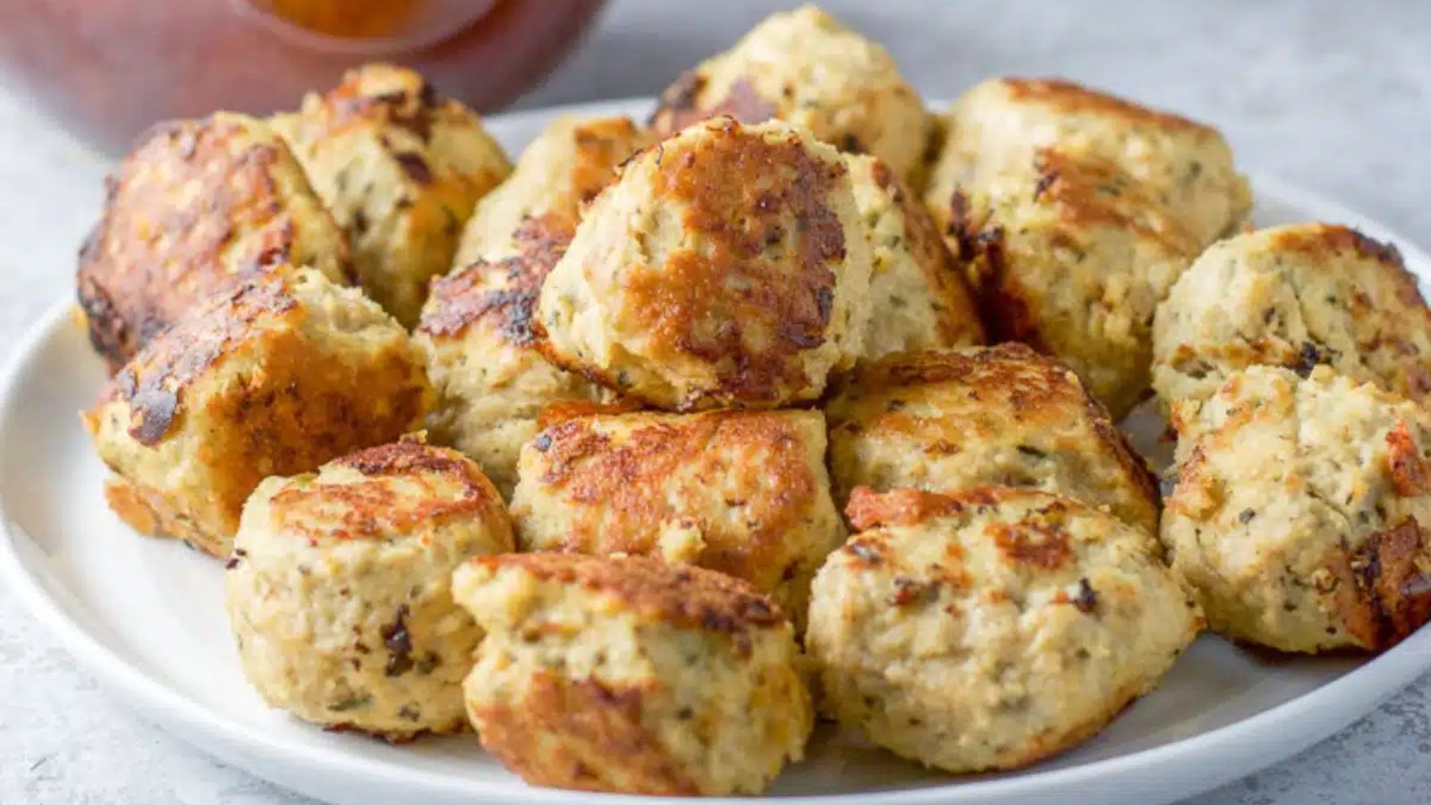 Chicken meatballs on a plate.