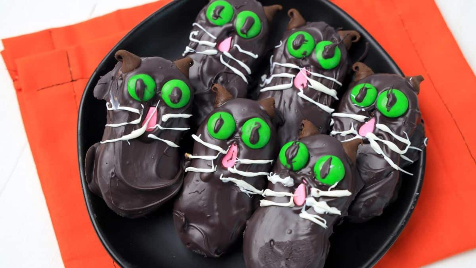 Hocus pocus cookies on a plate.