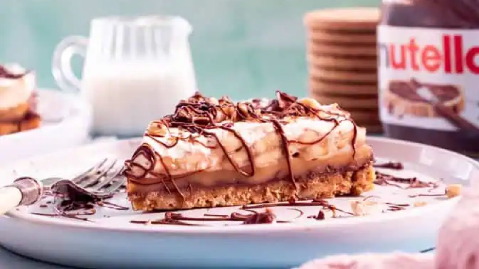 A slice of banofee pie with nutella drizzle.