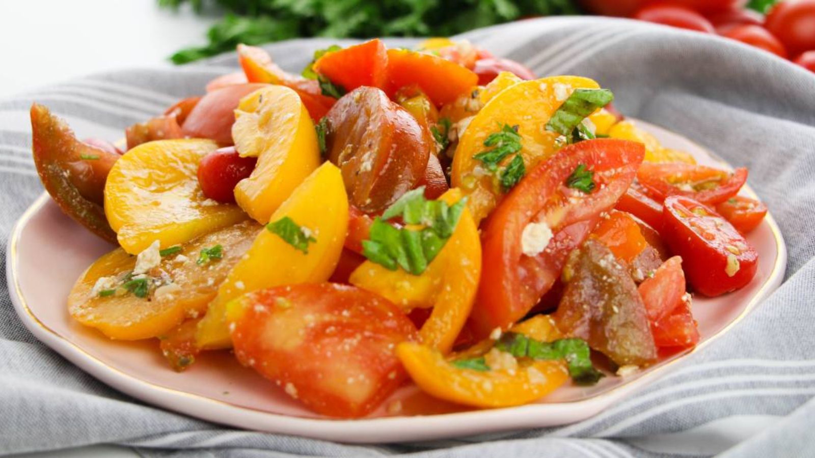 Colorful tomato salad on a plate.