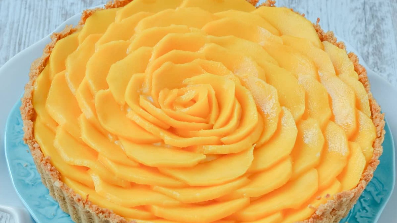 Close up shot of mango tart.