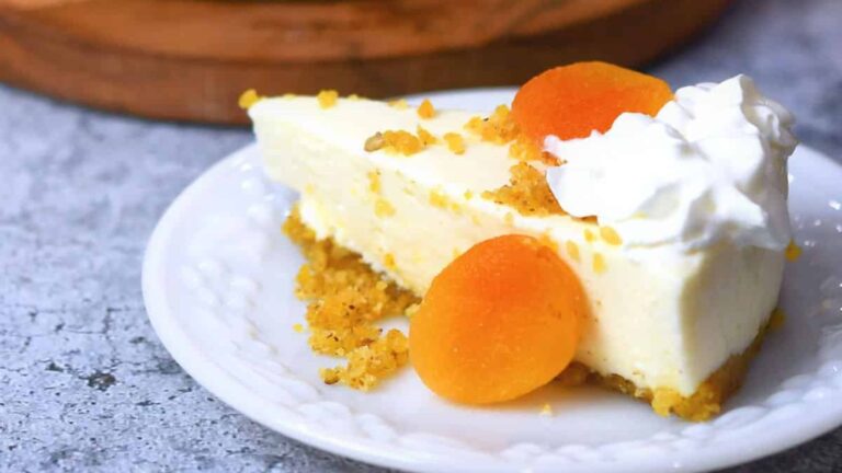 A slice of cheesecake apricot.