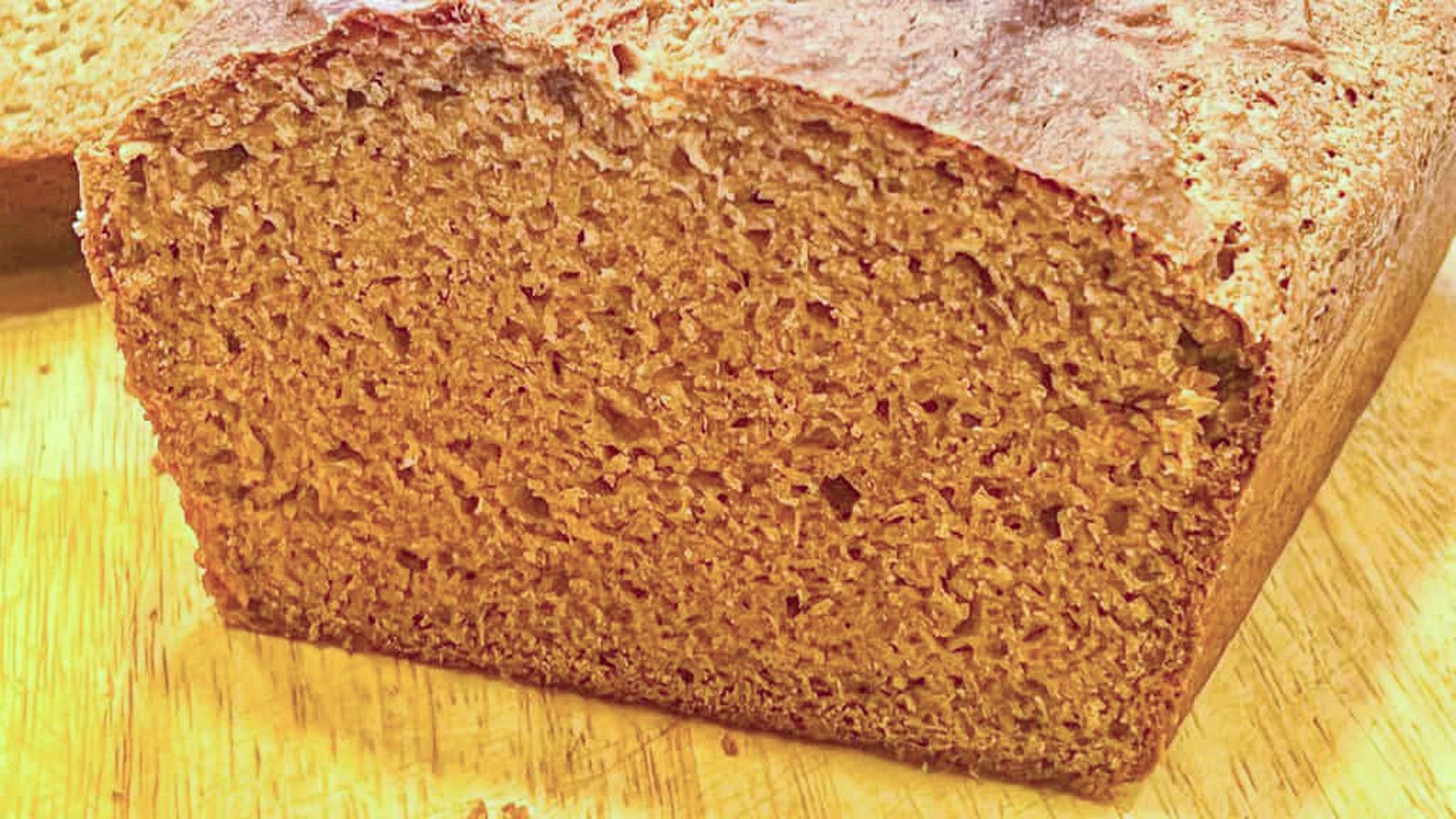Sliced dark brown bread.