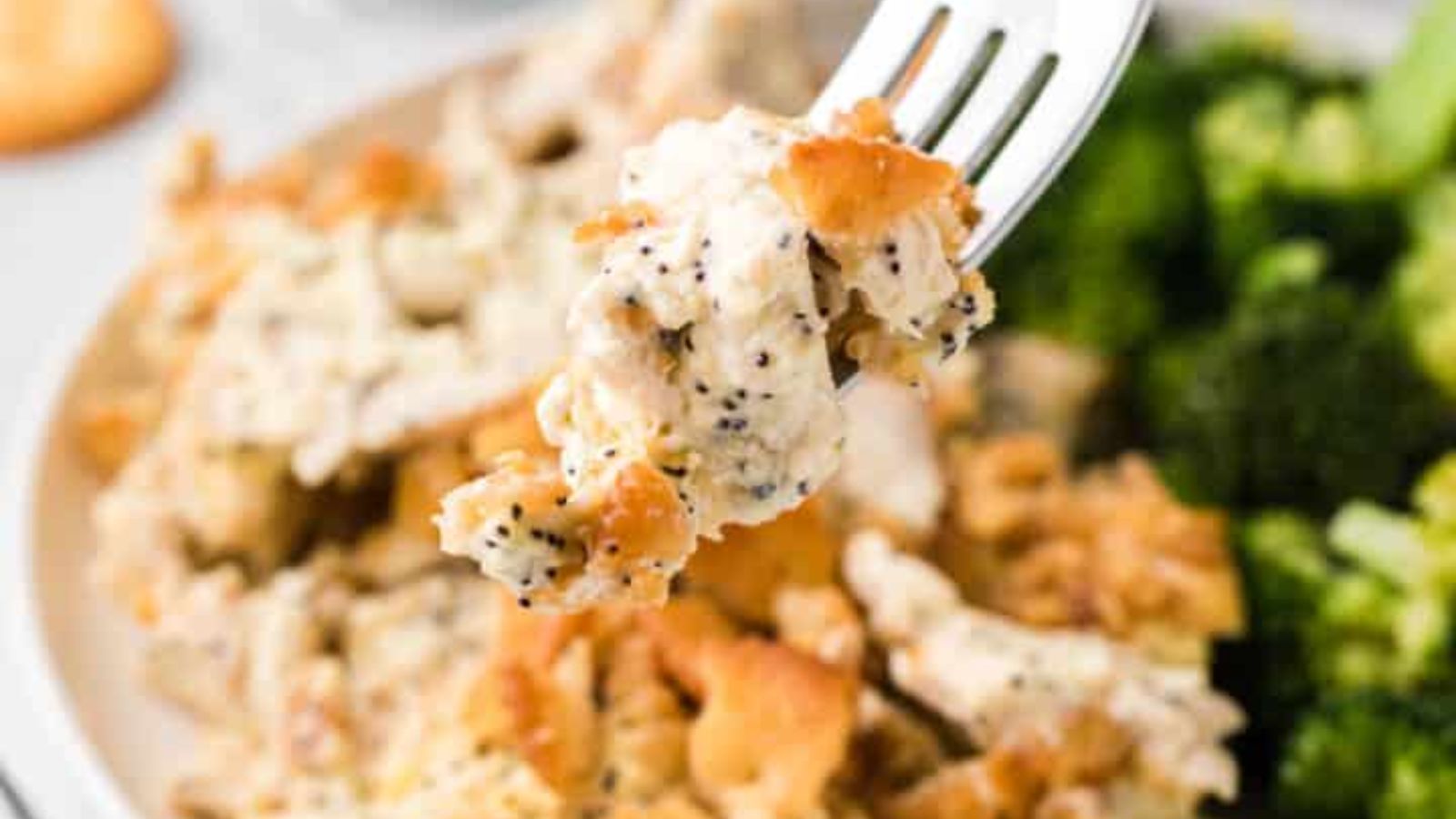 Chicken casserole on a fork.