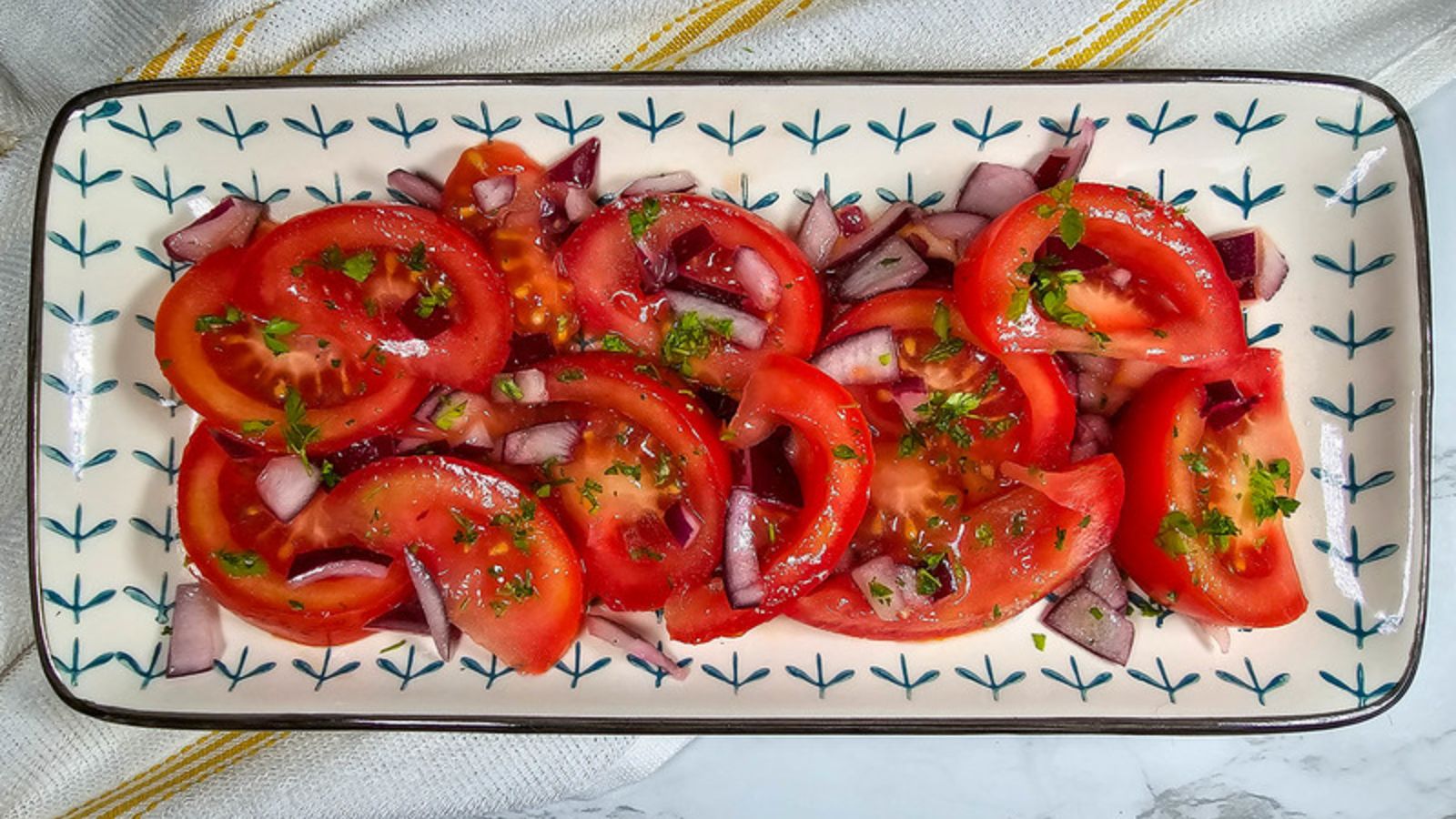 Tomato salad on a plate.