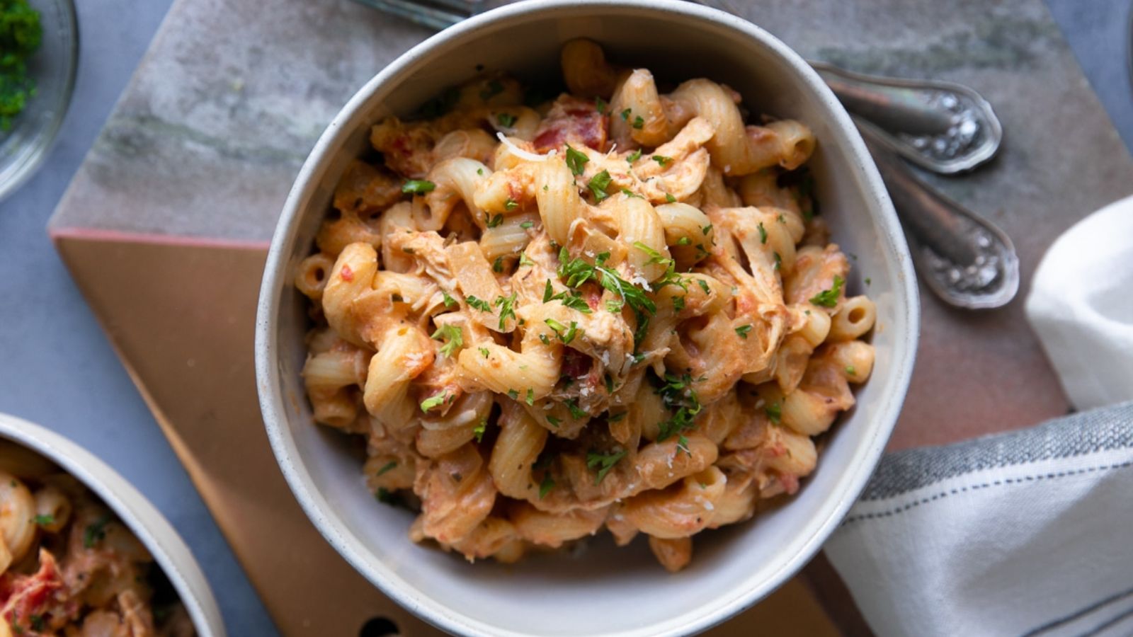 Creamy chicken pasta in a bowl.