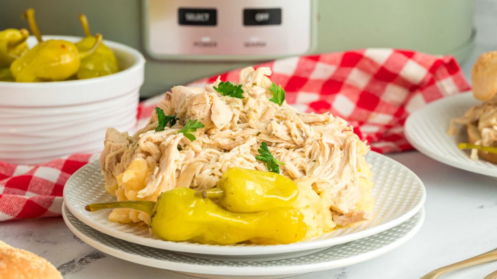 Slow cooker chicken on a plate.