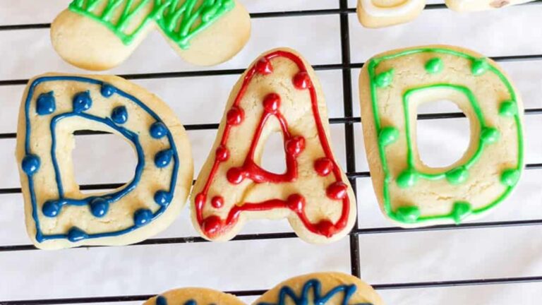 Cut out cookies that spell Dad.