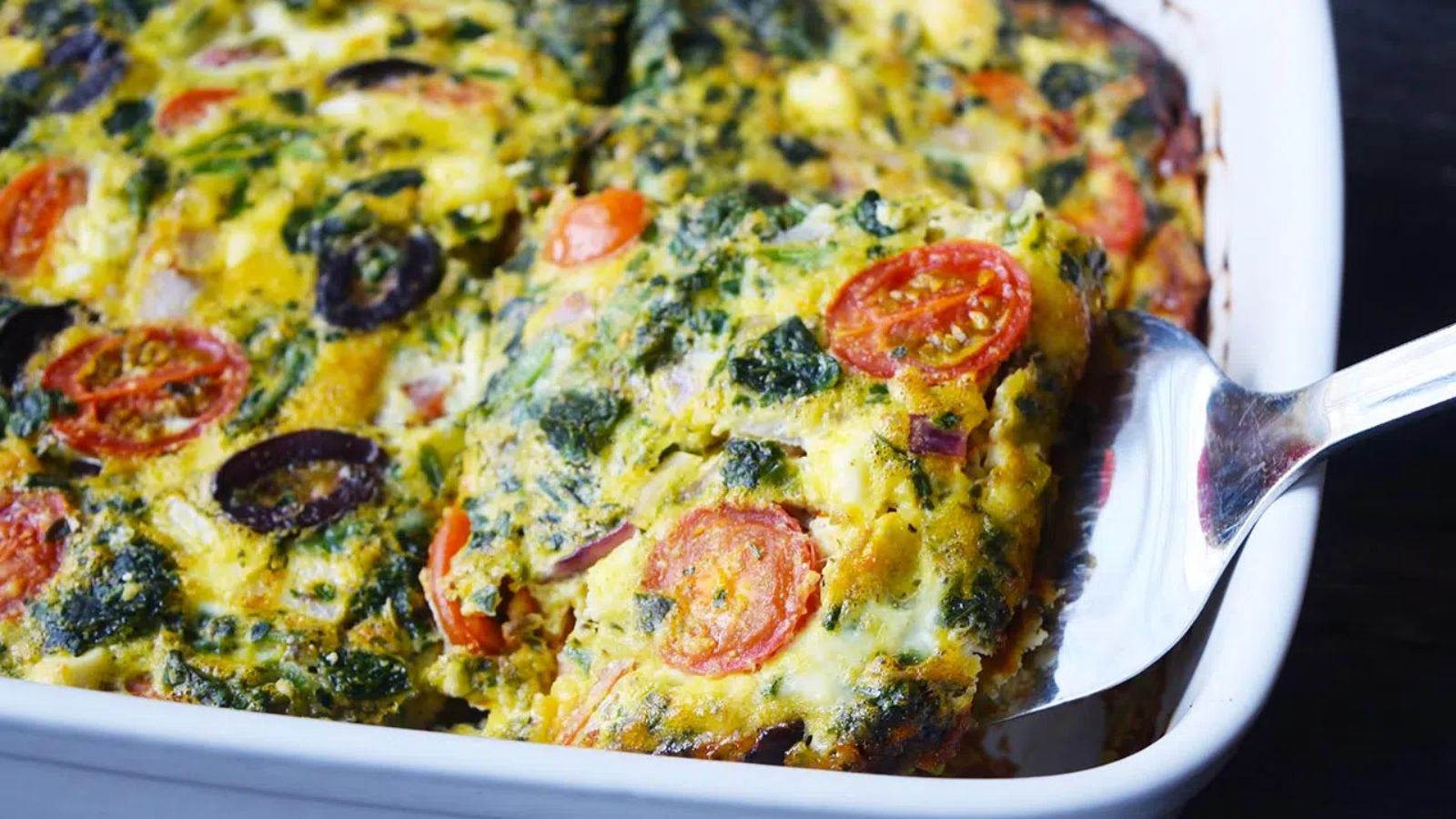 Spinach quiche on a tray.