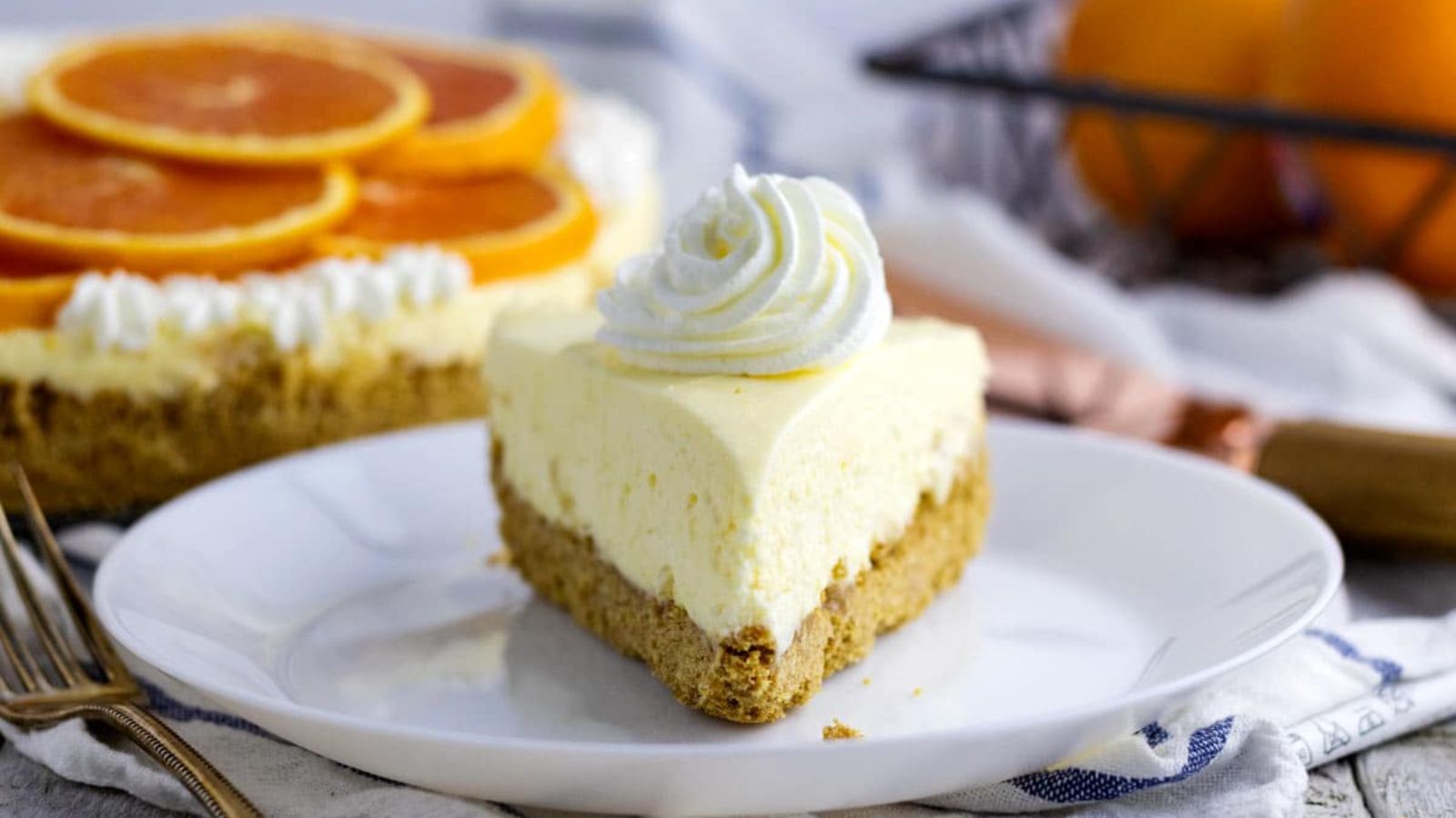 A slice of orange cheesecake.