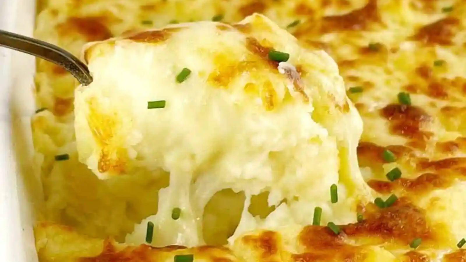 A spoon of mashed potatoes.