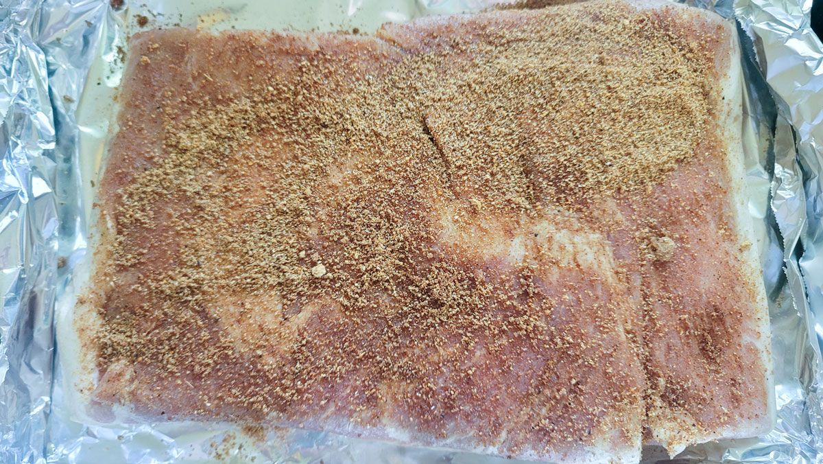 Dry rub added to the meat side of the belly.