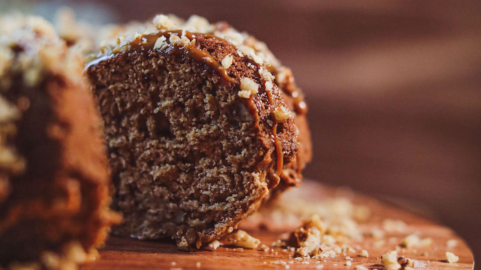 Apple cake made in a bundt cake pan and sliced.