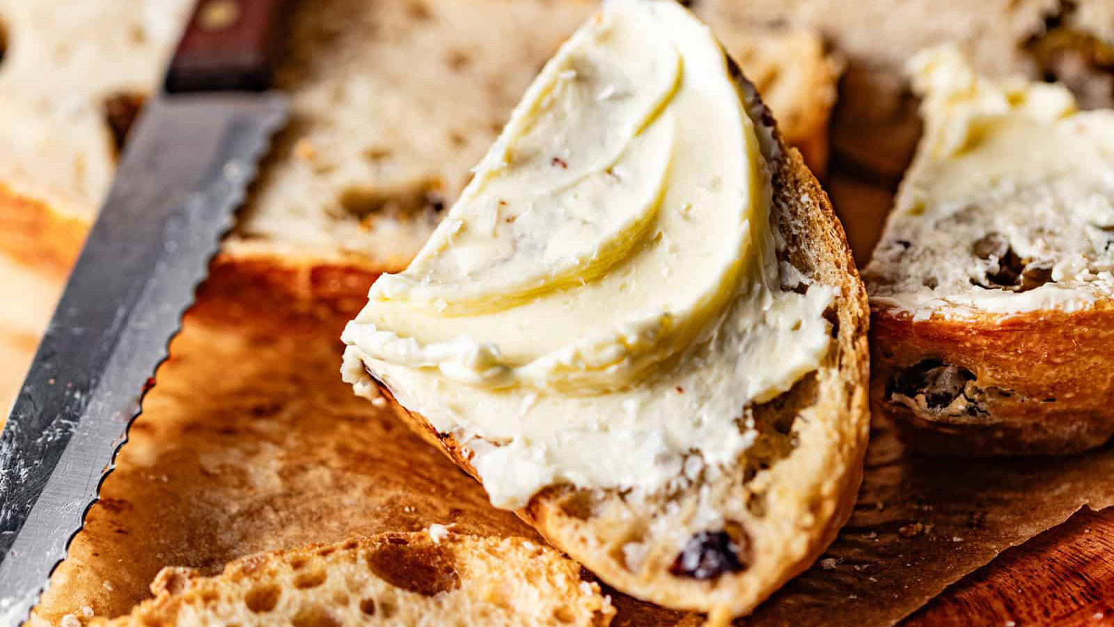 Olive bread sliced with butter.