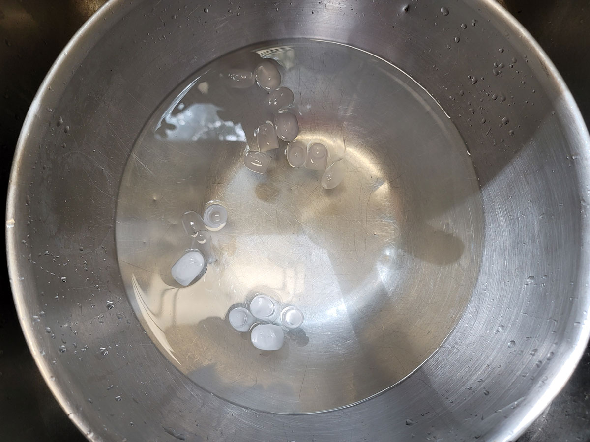 An ice bath set up in a large bowl.