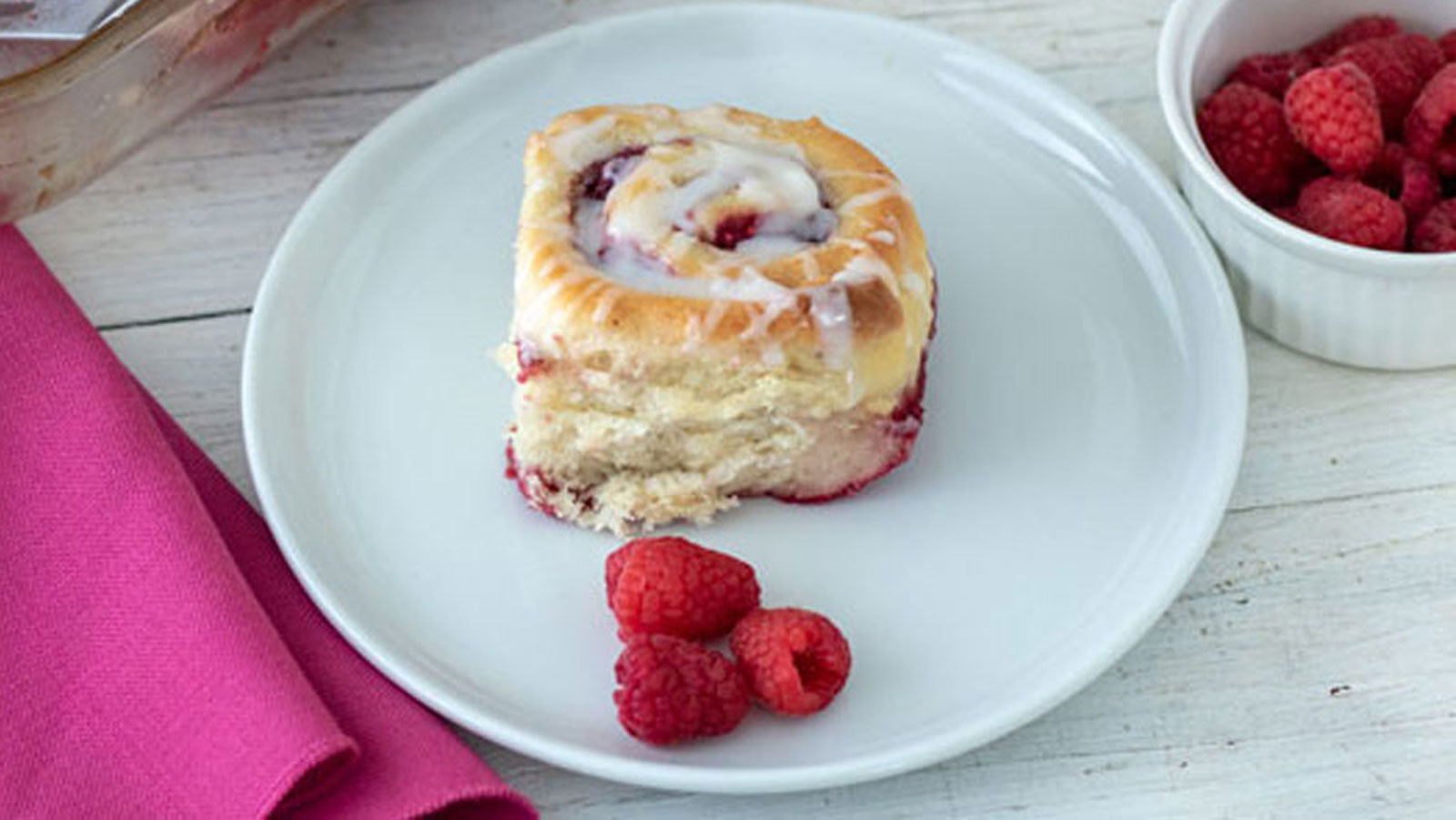 Close up of Raspberry cinnamon roll.