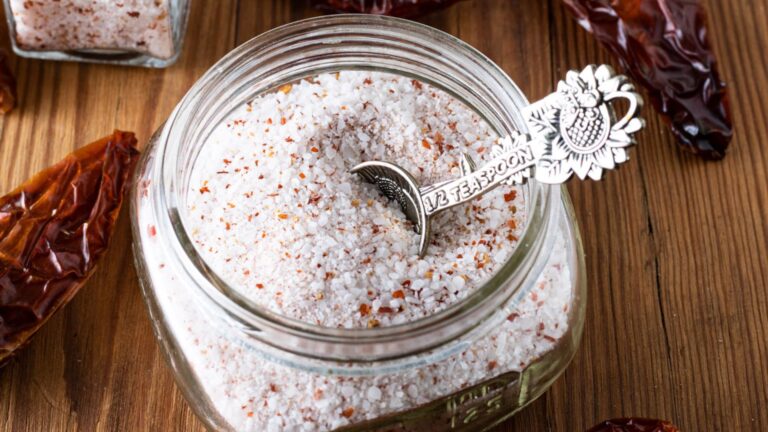 Salt in a canning jar with spoon.