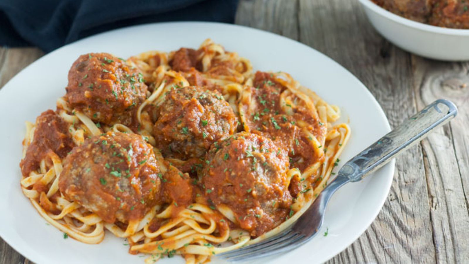 Pasta with venison meatballs on a plate.