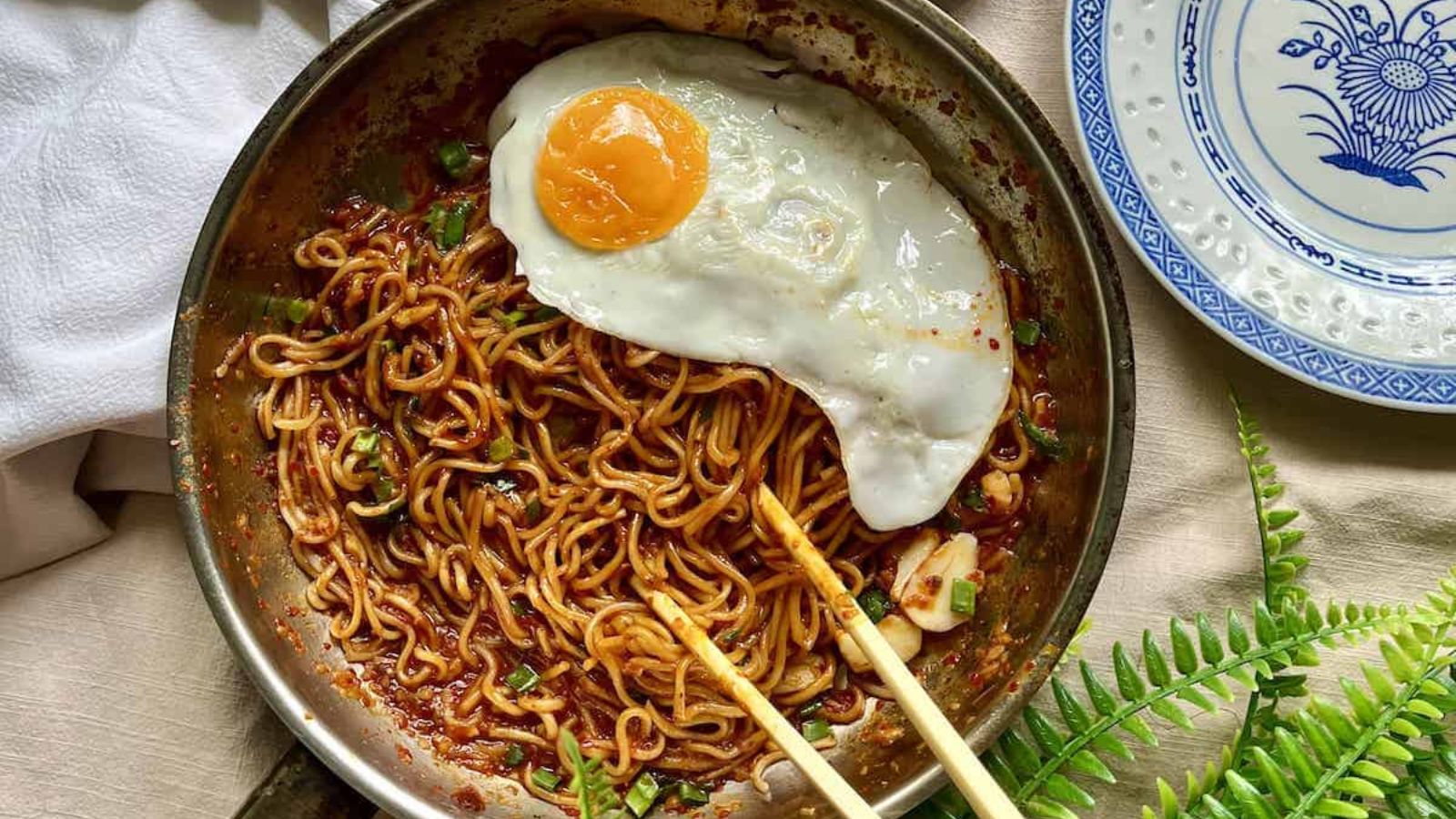 Gochujang noodles with sunny side up egg.