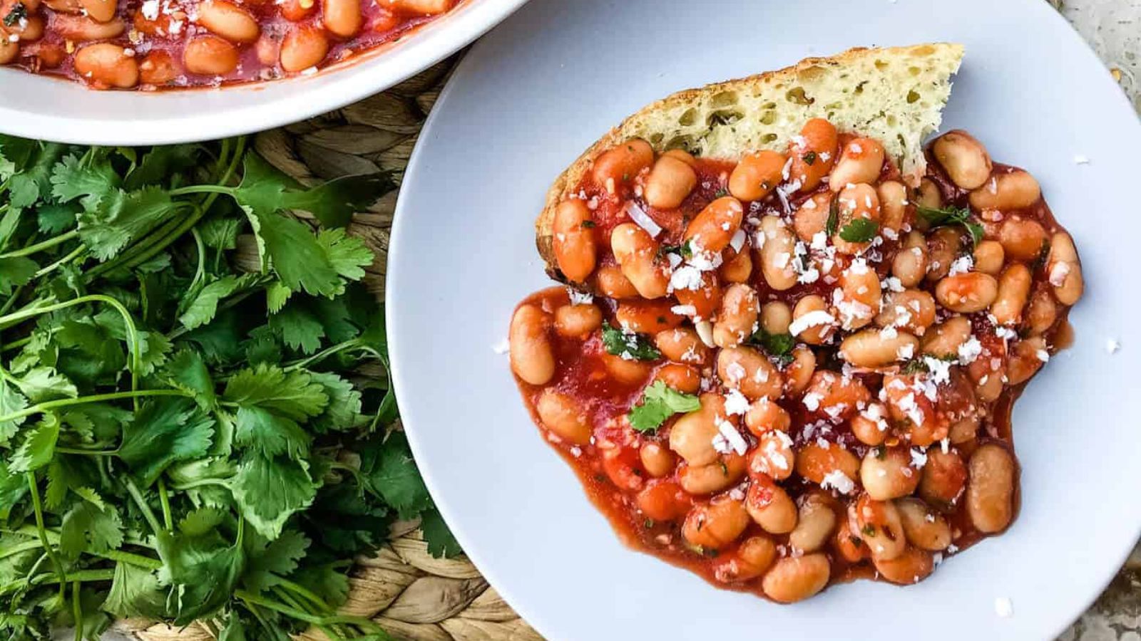 Arrabbiata beans on a plate.
