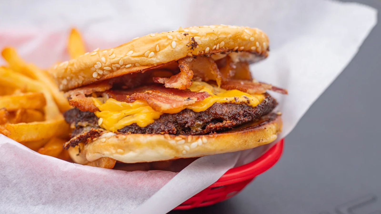 Blackstone smash burger with fries on the side.