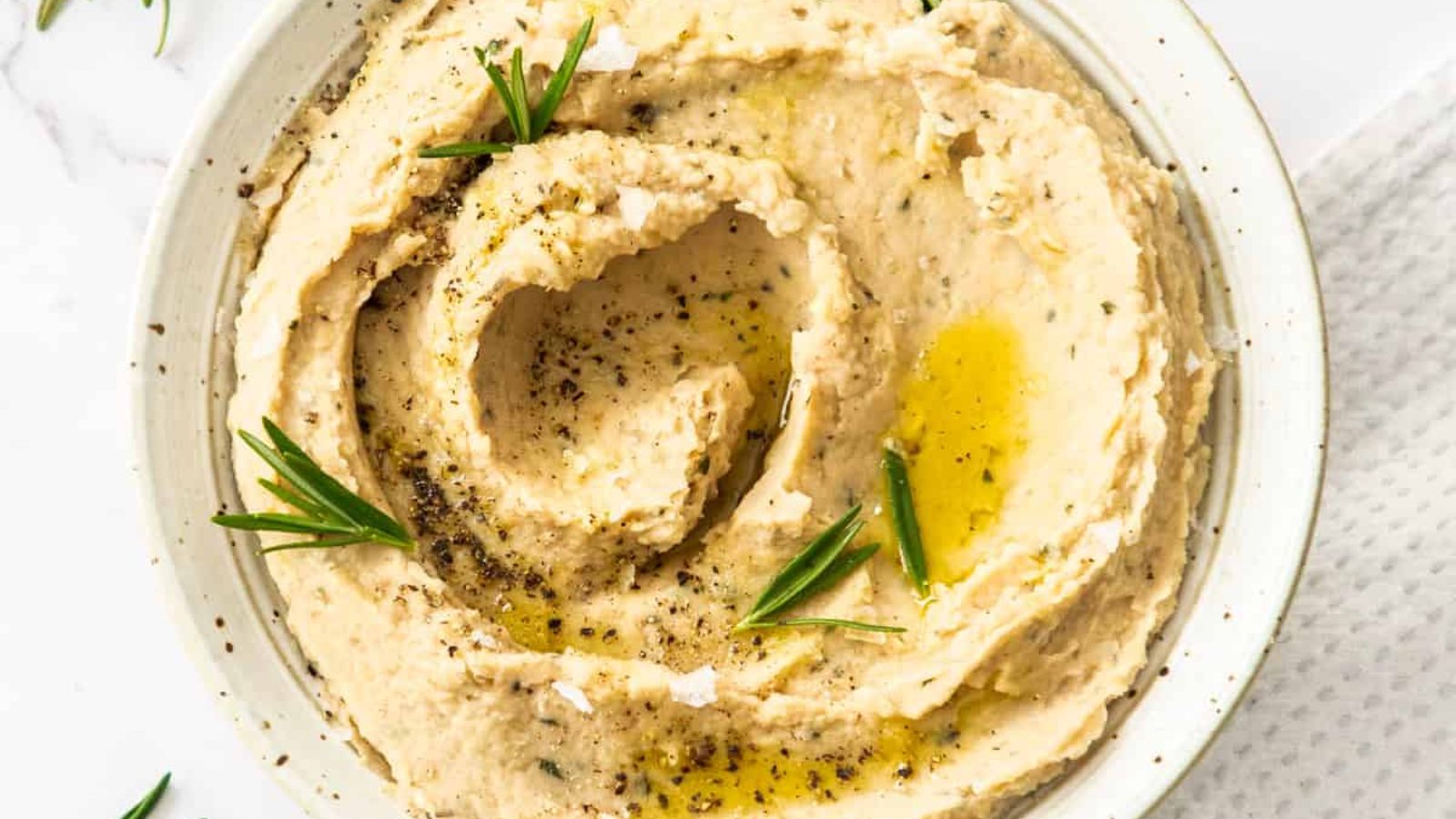Mashed butter bean in  a bowl.