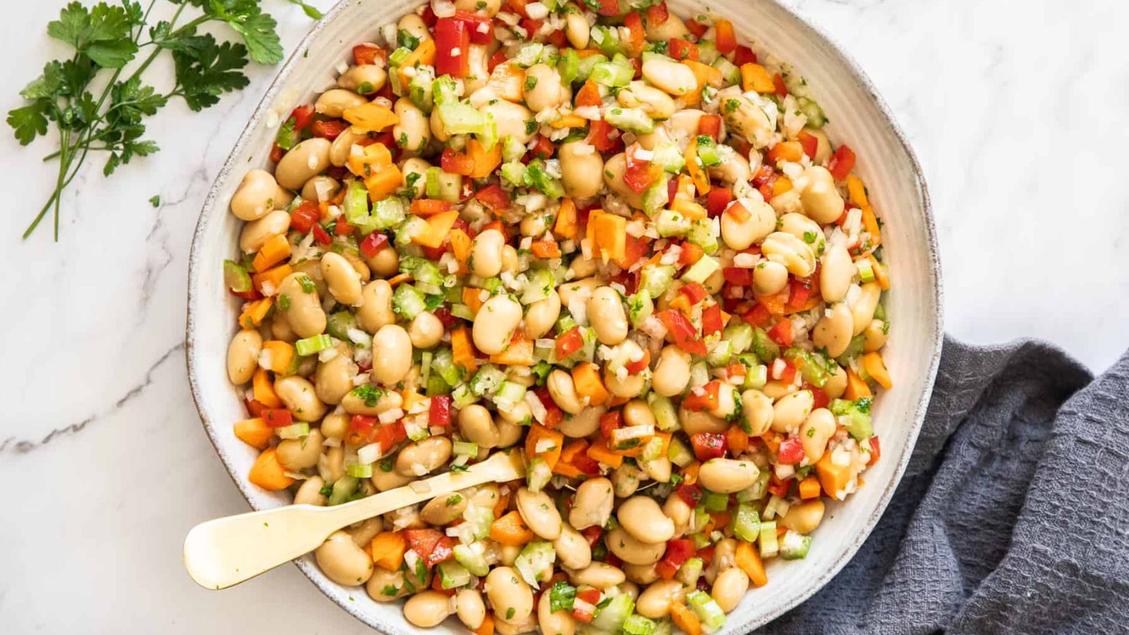 Butter bean salad in a bowl.