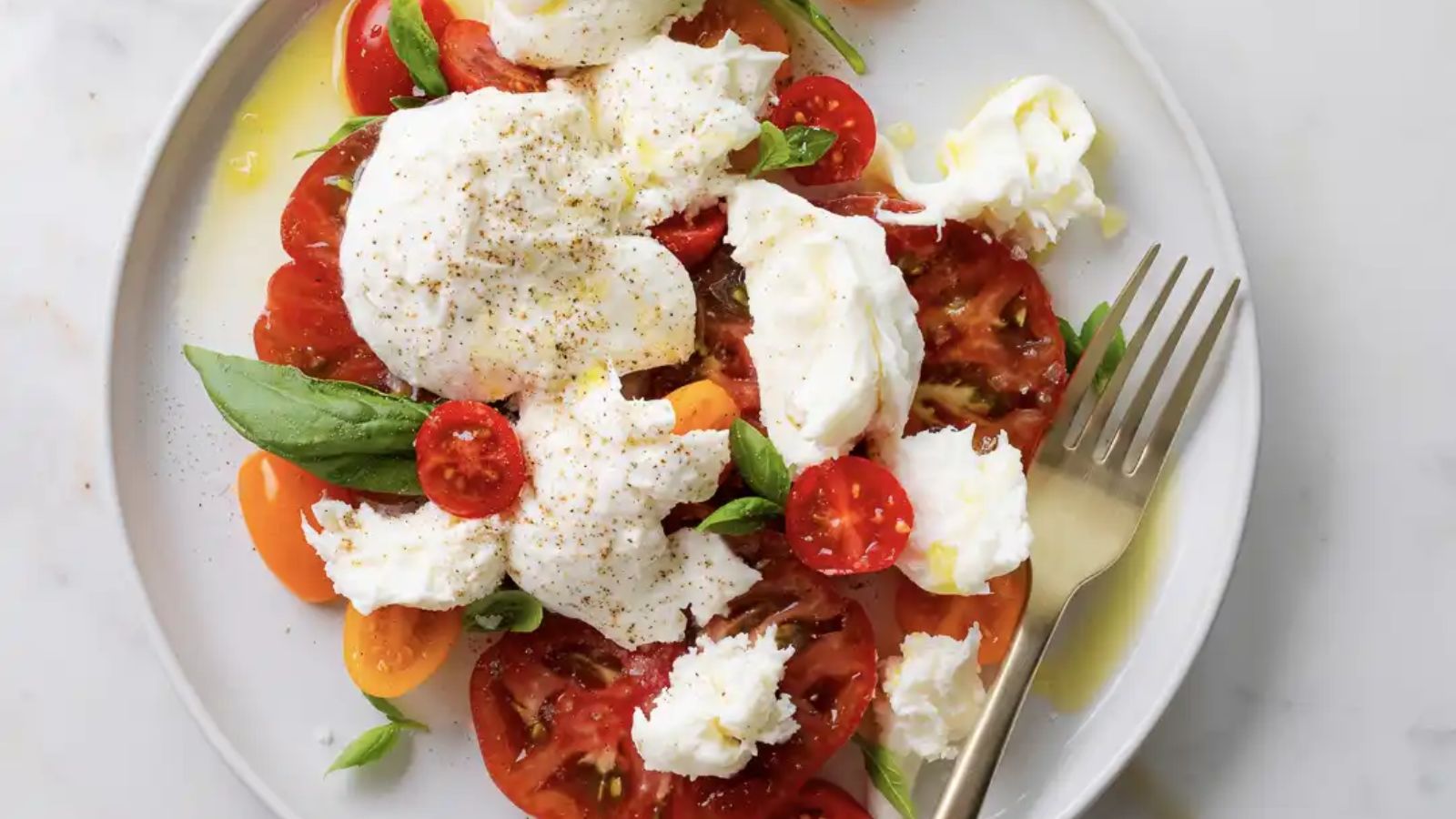 Caprese salad on a plate.