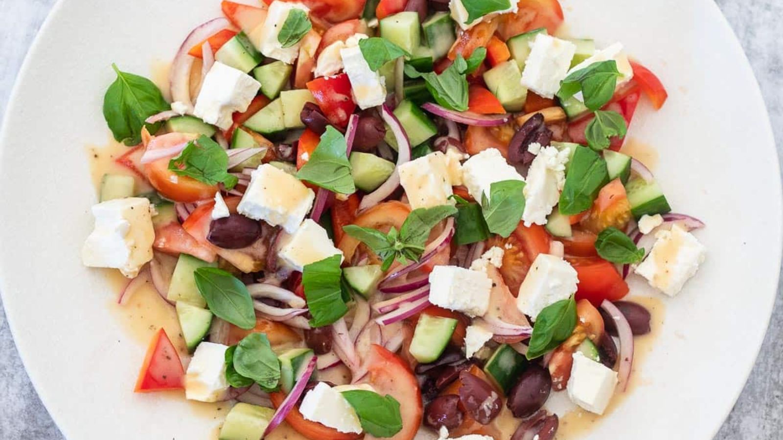 Greek salad on a plate.