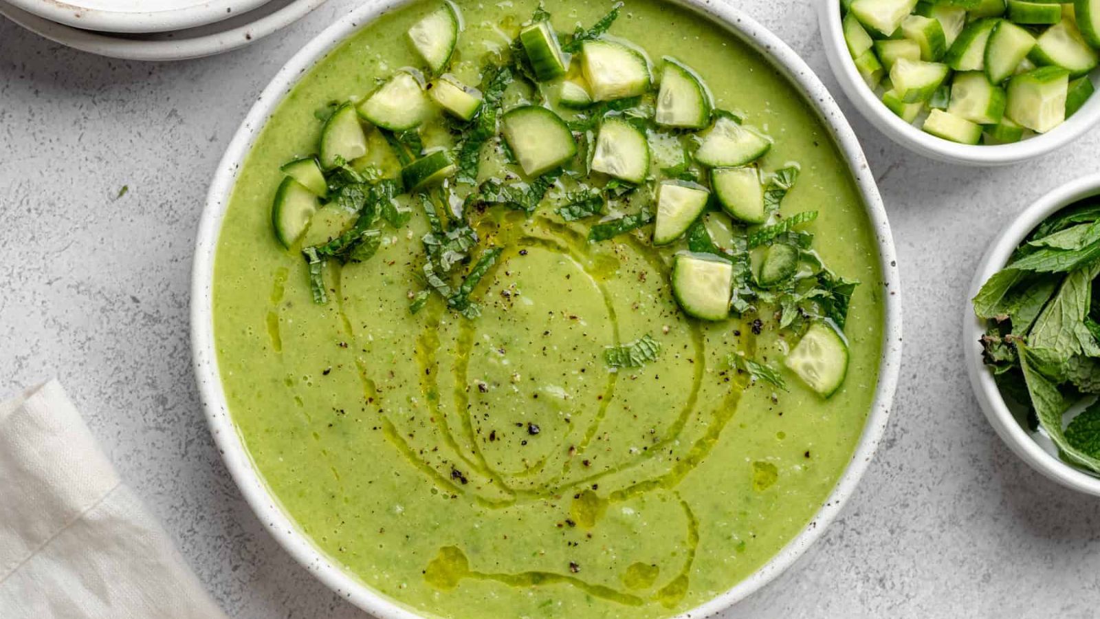 Cold cucumber gazpacho in a bowl.
