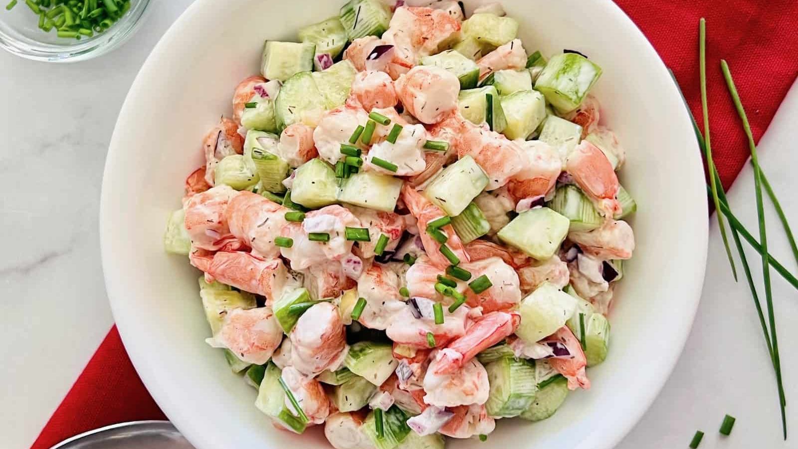 Cucumber shrimp salad in a bowl.