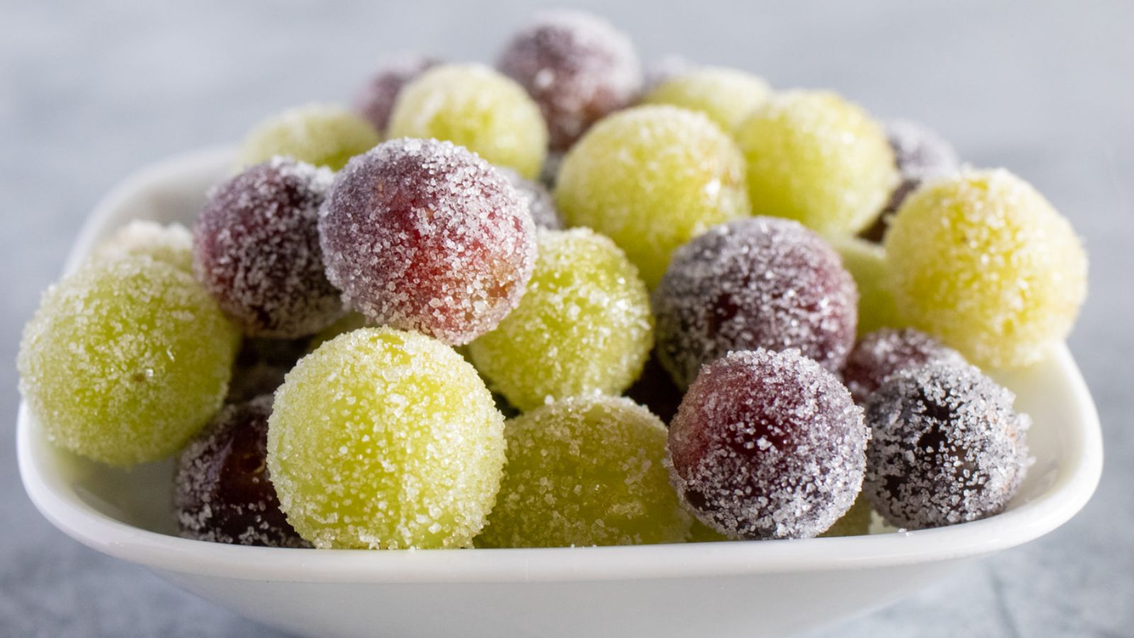 Candied grapes in a bowl.