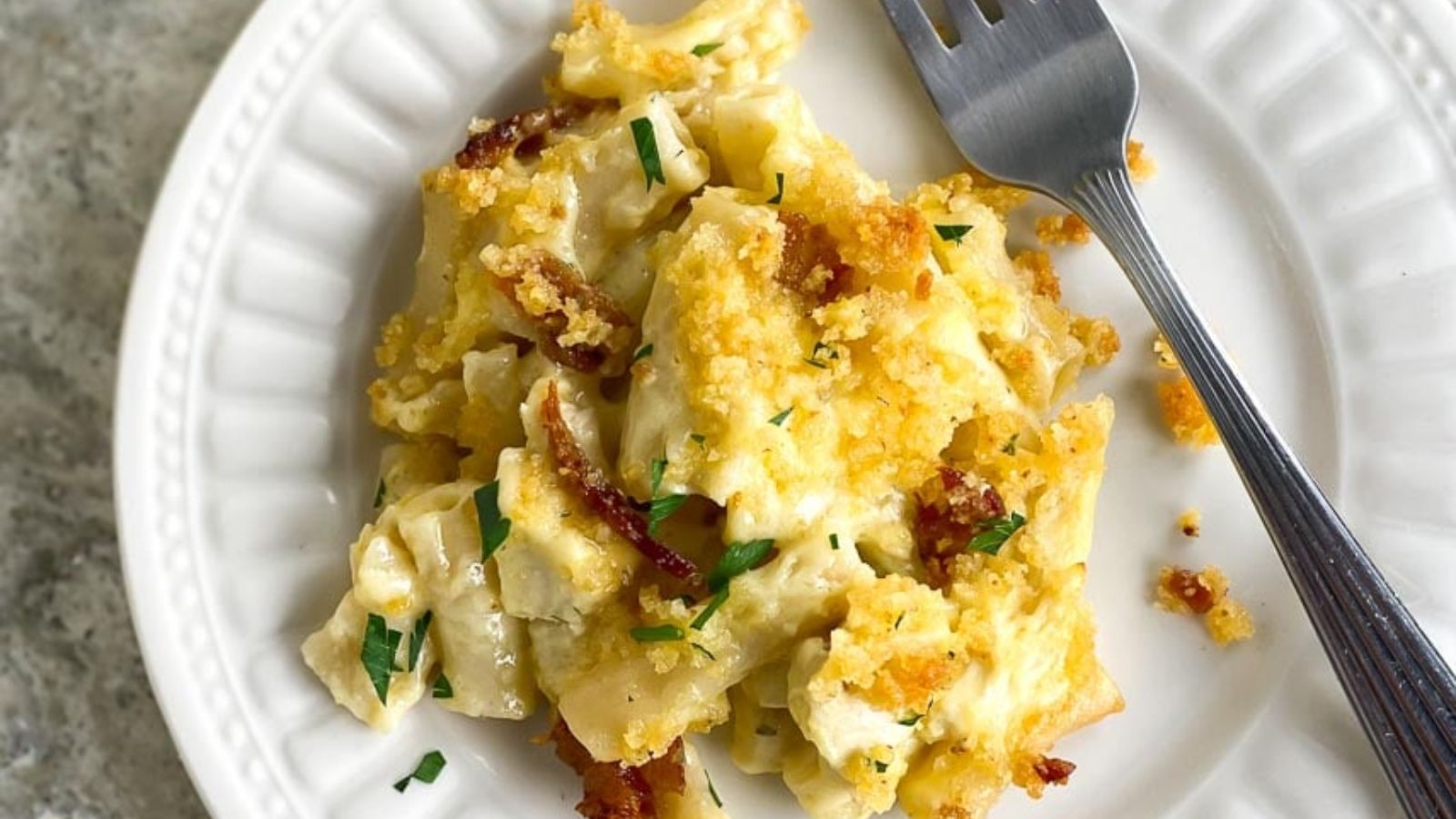 Mac and cheese on a plate.