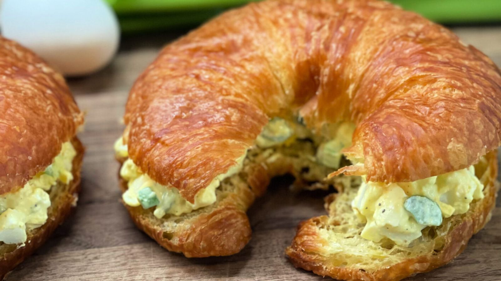Bread with egg salad inside.