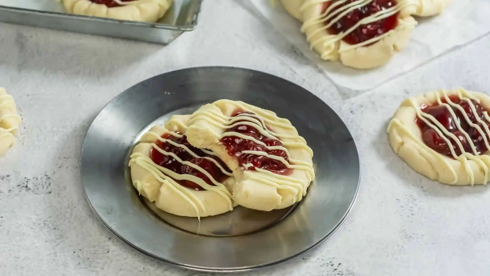 Cherry pie cookies on a plate.