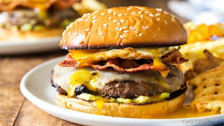 Fried egg burger on a plate.