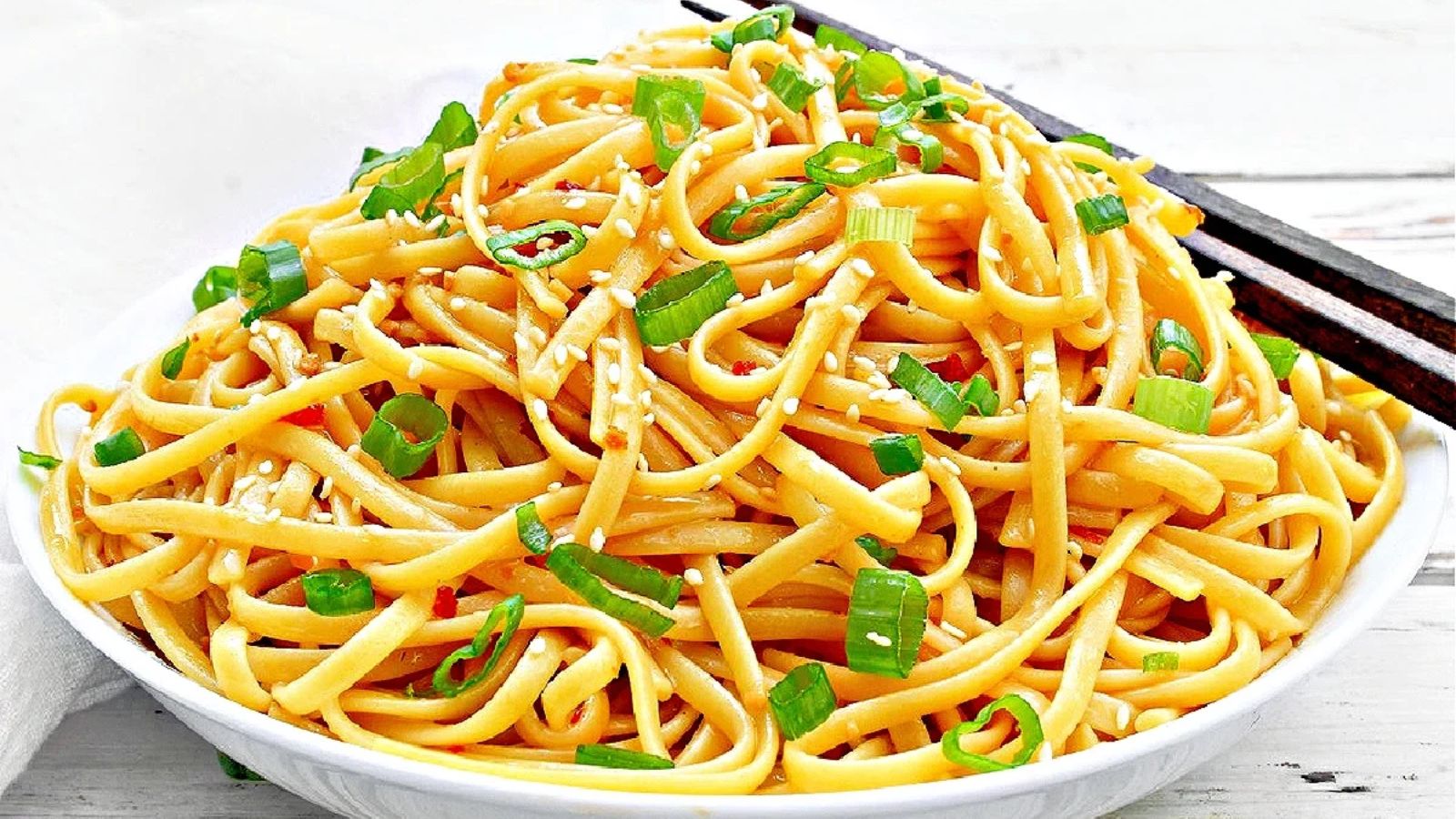 Sesame noodles in a bowl.