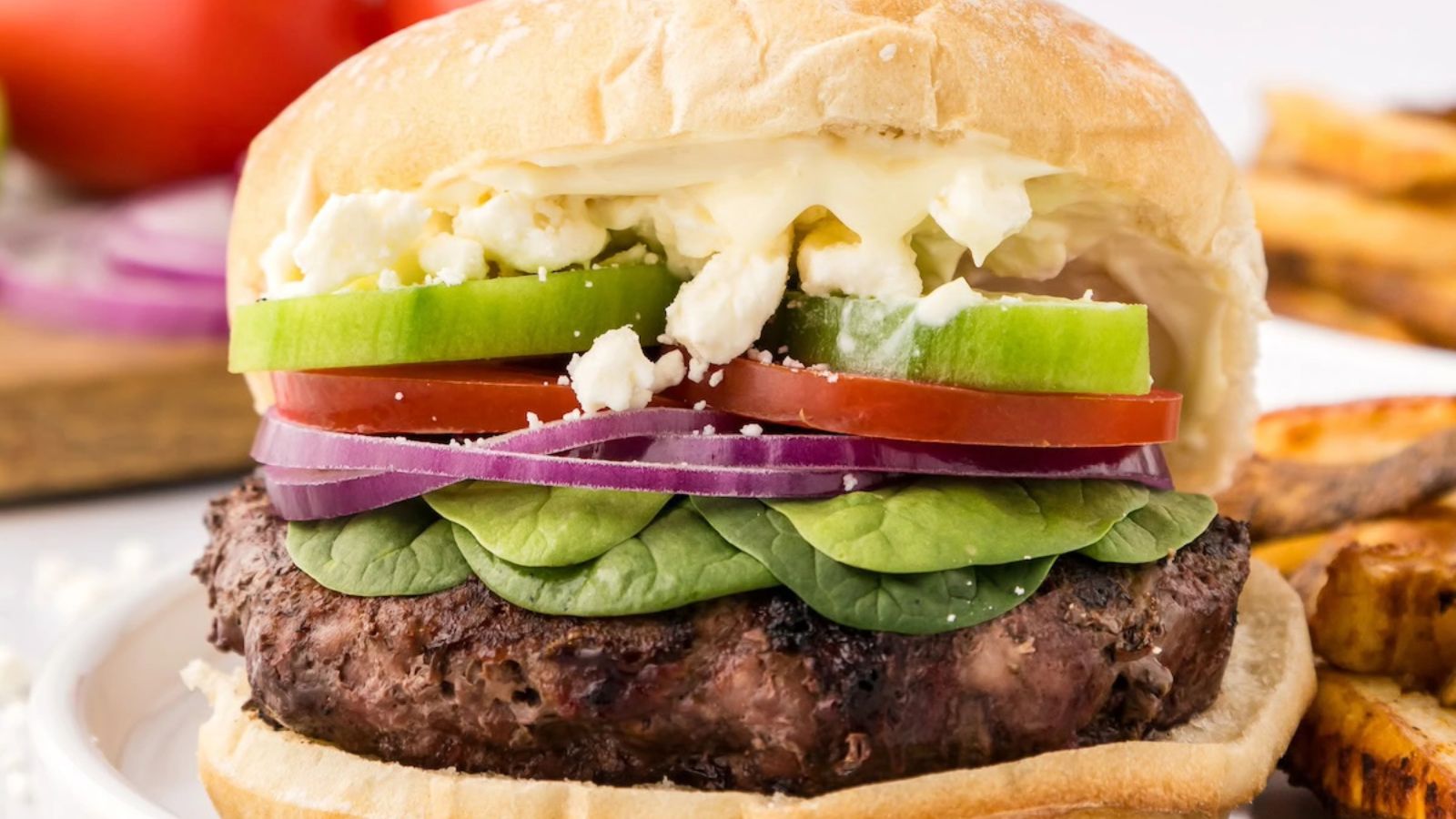 Greek burger on a plate. 