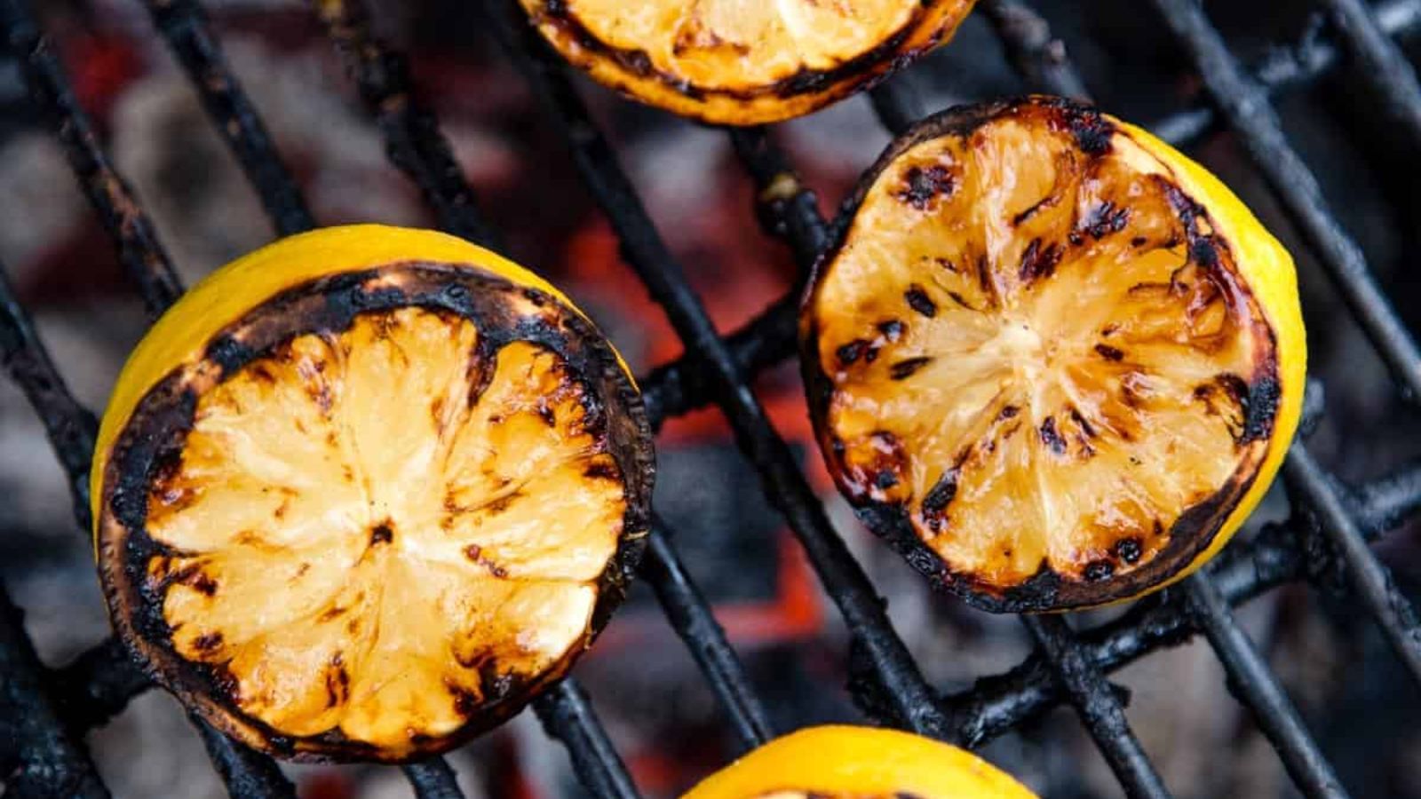 Grilled lemons on a griller.